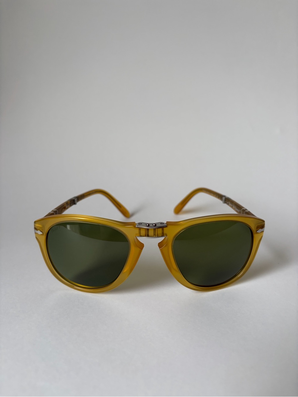 Persol 714SM - Steve McQueen Opal Yellow, polarized green lenses.